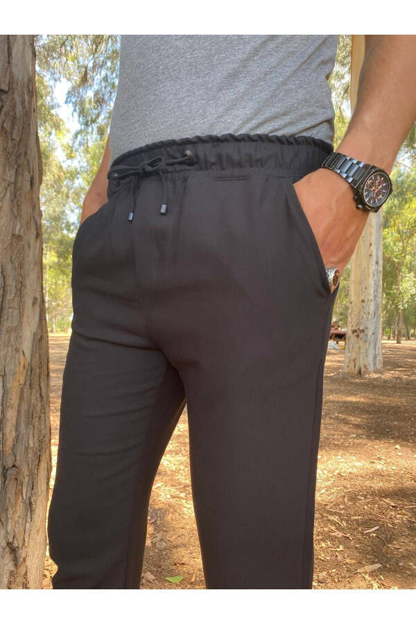 Slimfit mavsumiy qora likrali qulay Jogger shim - 12