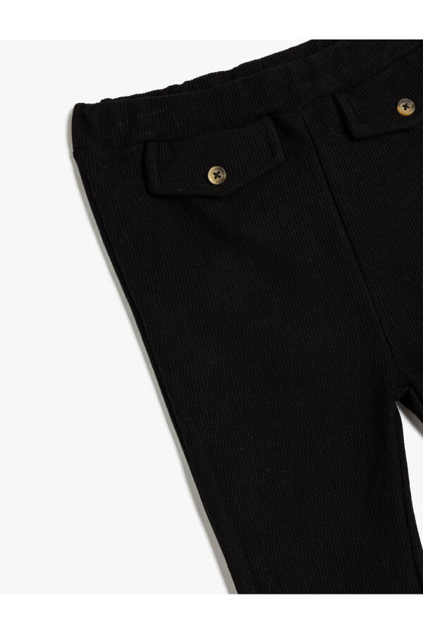 Spandex leggings with elastic waistband, pockets, buttoned corset detail, and viscose blend. - 3