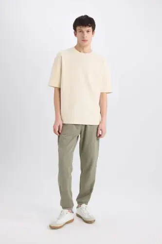 Спортивные брюки Regular Fit с карманами на молнии Светло-хаки - DEFACTO (1)