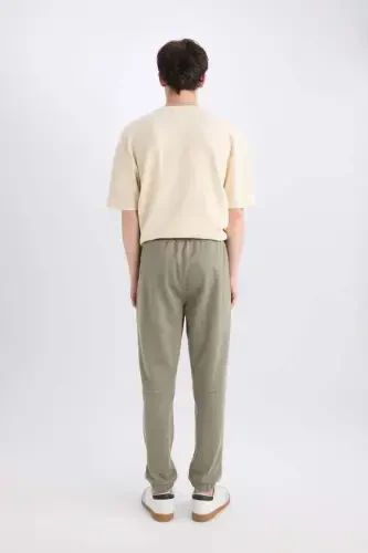 Спортивные брюки Regular Fit с карманами на молнии Светло-хаки - 6