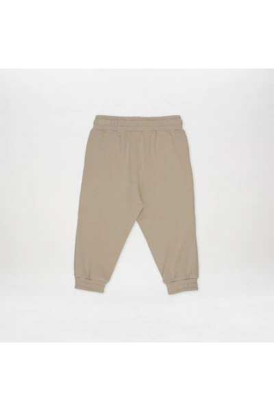 Спортивные штаны для девочек бежевого цвета - 10