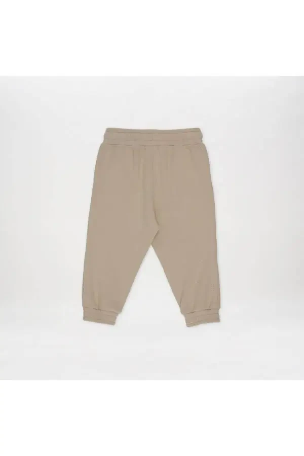 Спортивные штаны для девочек бежевого цвета - 10