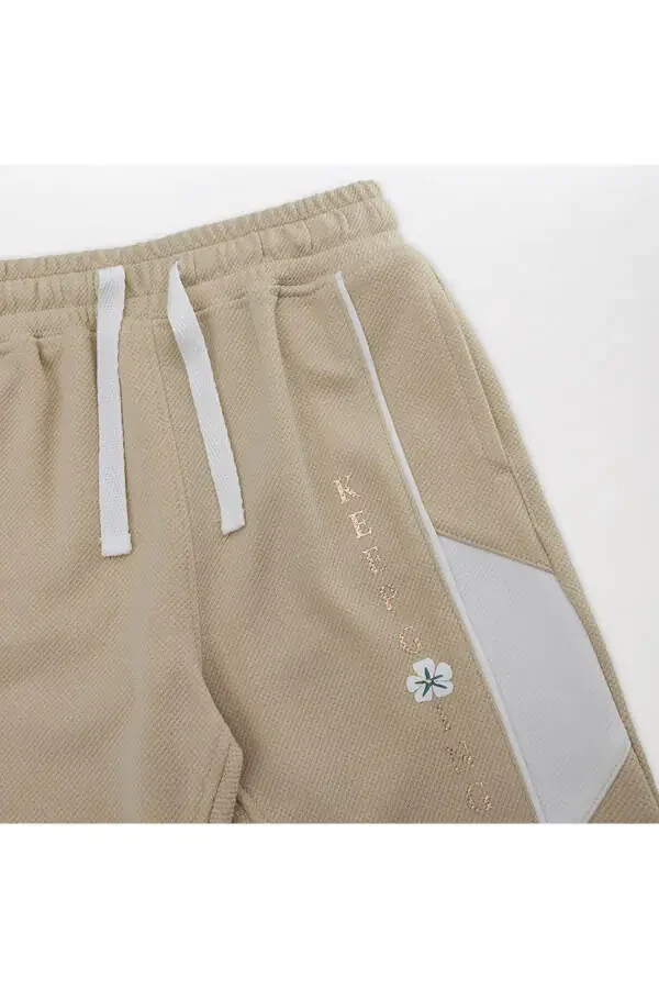 Спортивные штаны для девочек бежевого цвета - 11