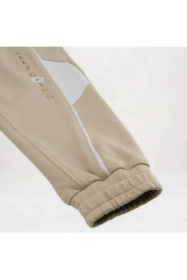 Спортивные штаны для девочек бежевого цвета - 12