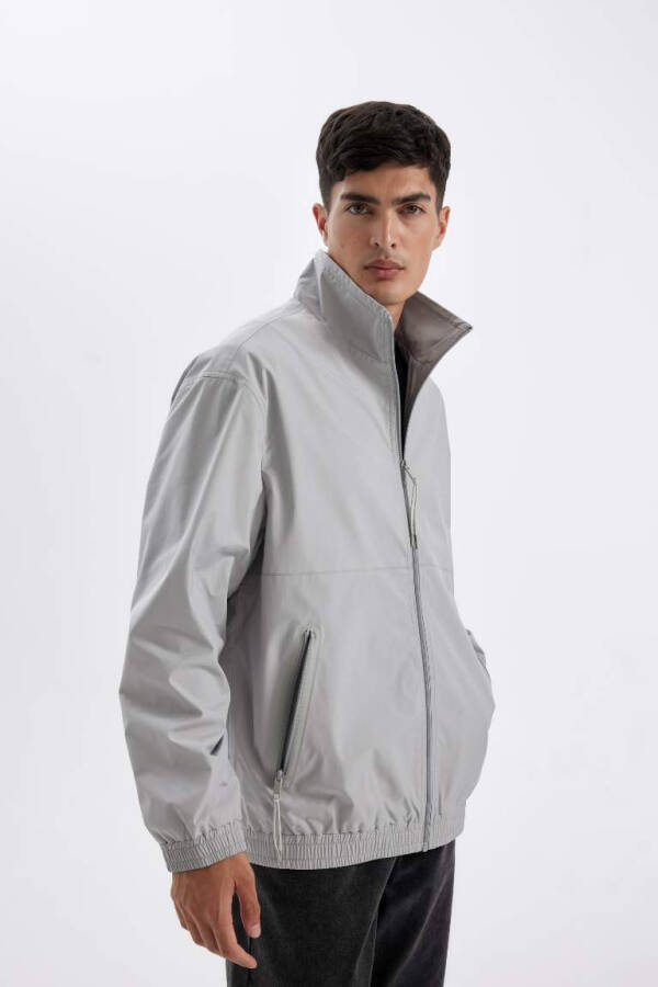 Stand Collar Jacket with Zippered Pockets in Light Gray for All Seasons - 1