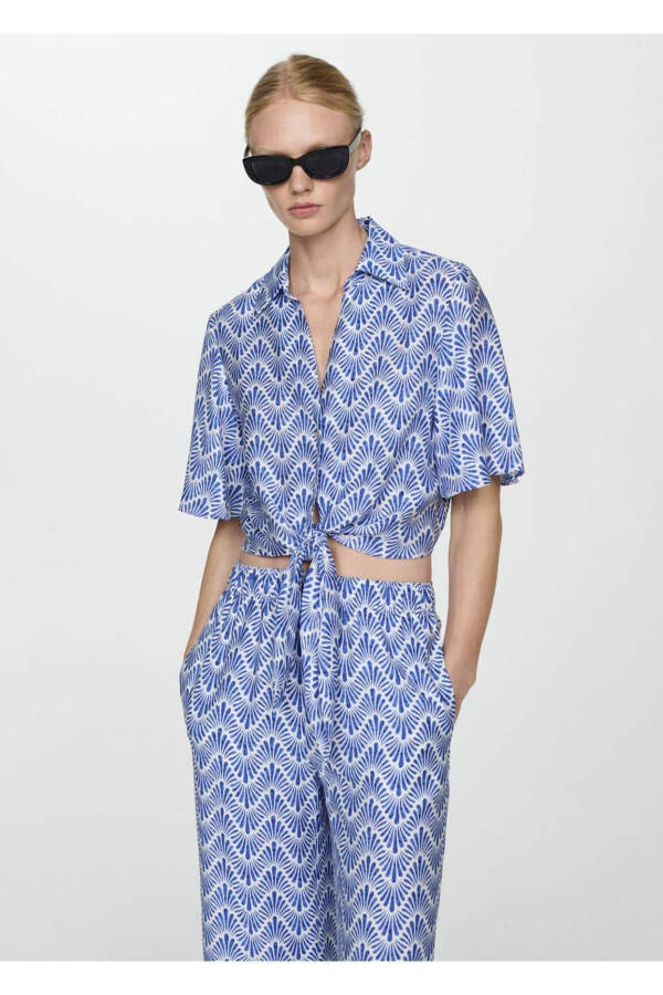 Straight-leg patterned trousers - 7