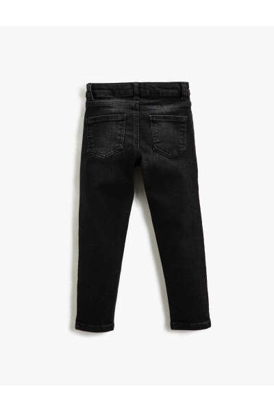 Straight leg, regular waist jeans. - 9