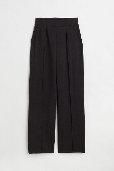 Stylish, high-waisted trousers. - 1