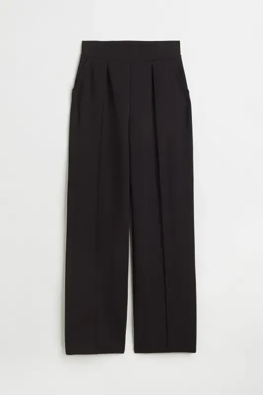 Stylish, high-waisted trousers. - 3
