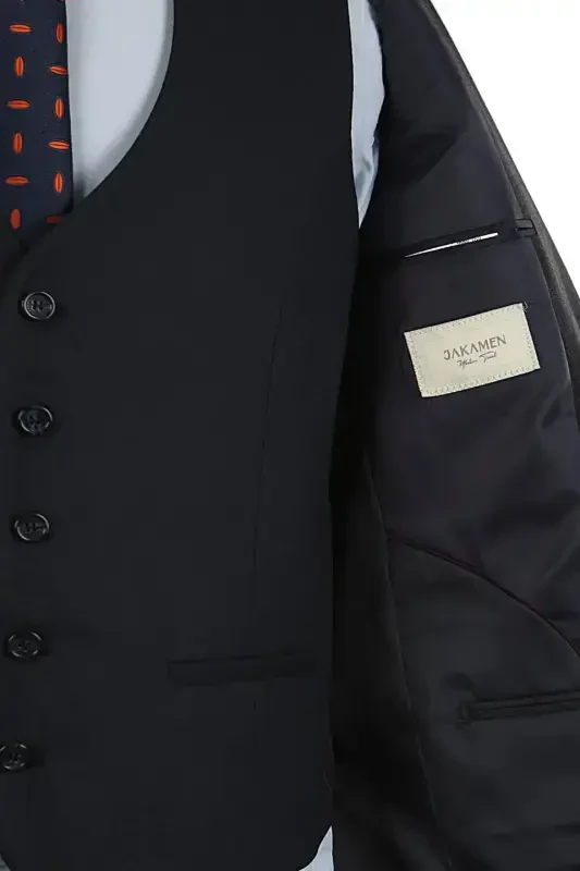 Темно-синий облегающий костюм из трех частей с пиджаком с острыми лацканами и жилетом в полоску - 1