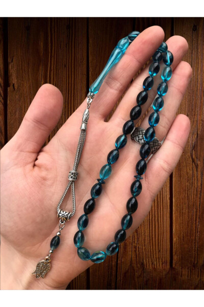 Transparent, blue beaded rosary in a wooden box. - 2