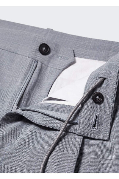 Trousers with clasp pattern - 7