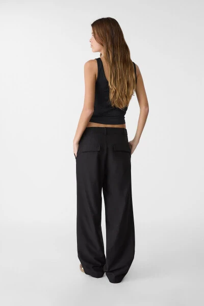 Trousers with pockets - 3
