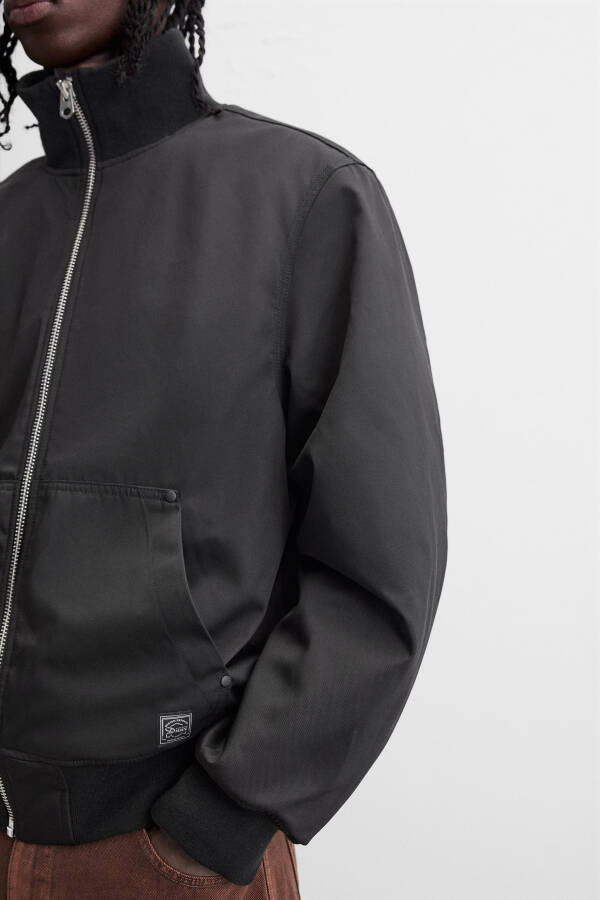 Waterproof bomber jacket - Black - 14