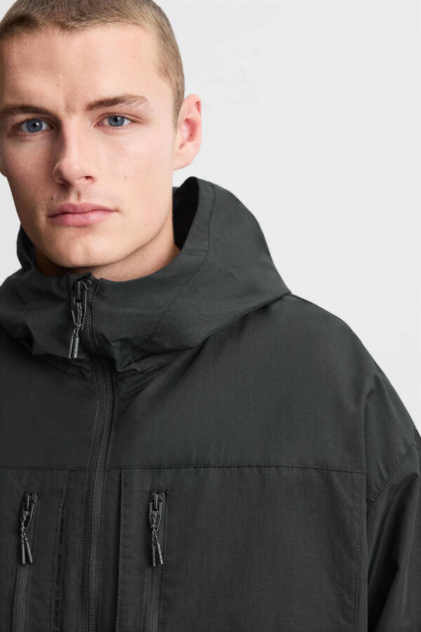 Waterproof hooded jacket (Black) - 14