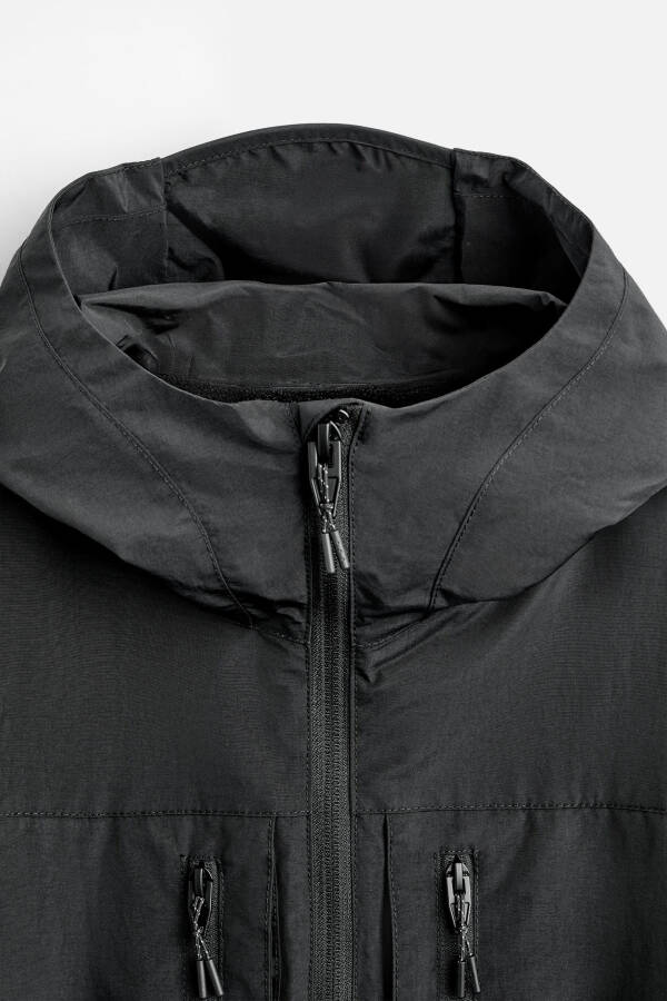 Waterproof hooded jacket (Black) - 18