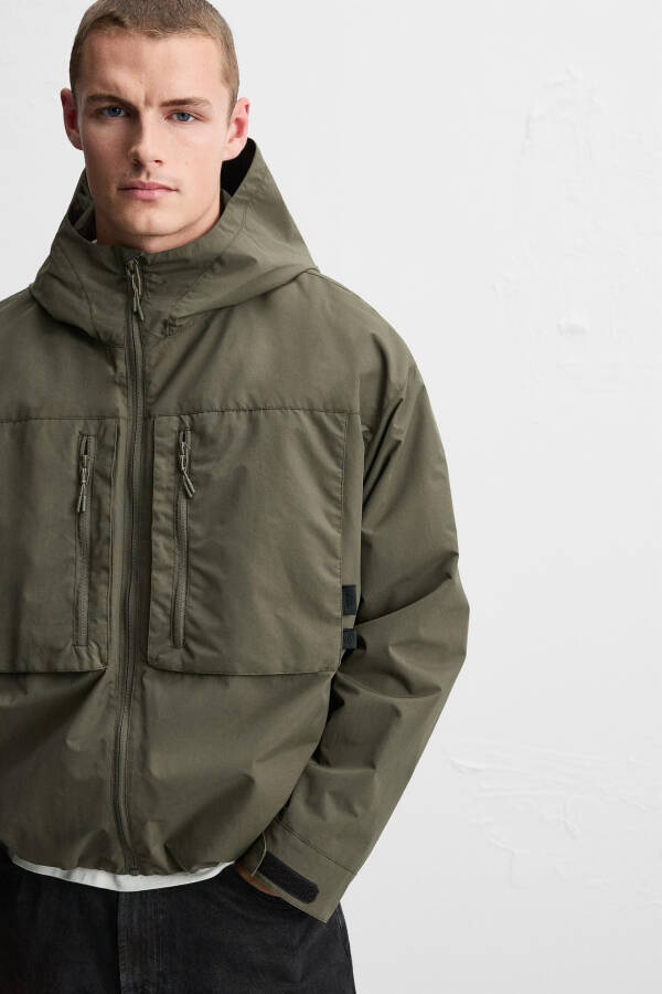 Waterproof hooded jacket (Light khaki) - 15