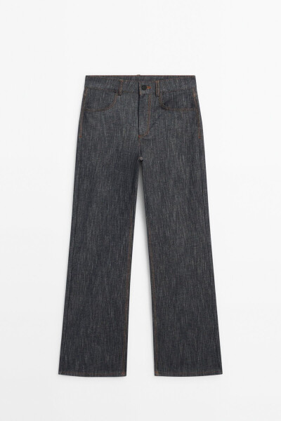 Wide-leg, detailed, textured jean. - 10