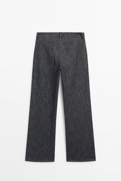 Wide-leg, detailed, textured jean. - 7