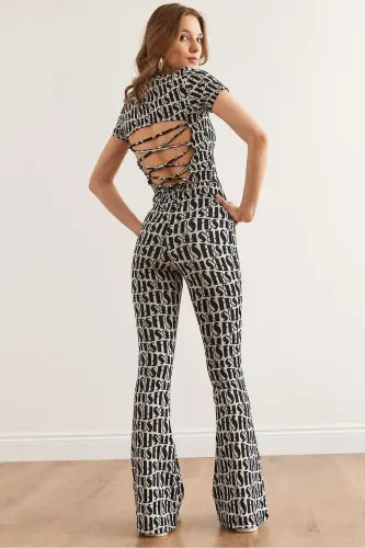 Woman Black White Backless Blouse Flared Pants - 1