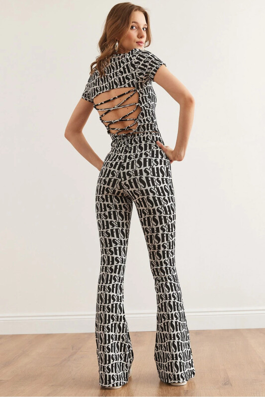 Woman Black White Backless Blouse Flared Pants - 1