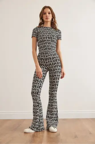 Woman Black White Backless Blouse Flared Pants - OLALOOK (1)