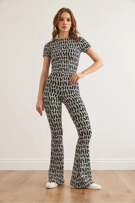 Woman Black White Backless Blouse Flared Pants - 3