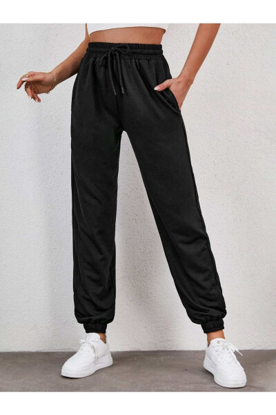 Women's Black Elastic Waist and Cuffs Pocket Tracksuit Bottoms Arm-22Y024062 - 1