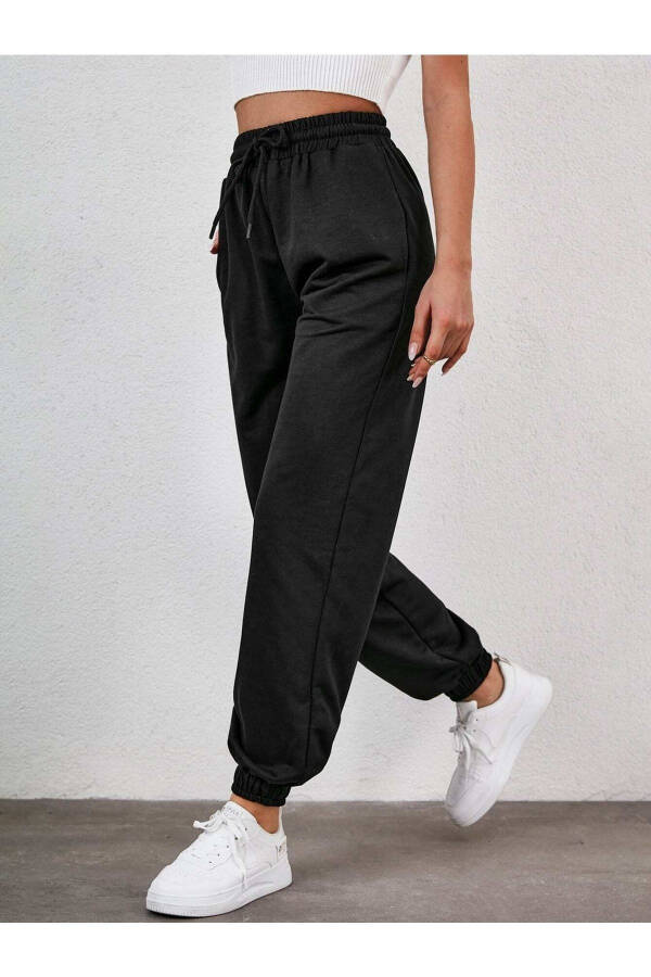 Women's Black Elastic Waist and Cuffs Pocket Tracksuit Bottoms Arm-22Y024062 - 4