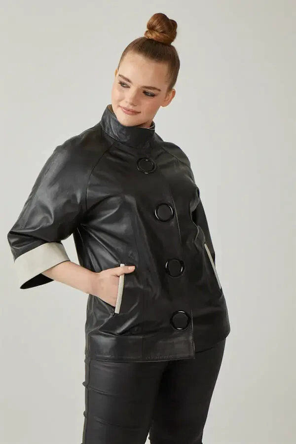 Women's genuine leather jacket, black color, beige lining, snap closure, Truvakar sleeve, wide cut. - 1