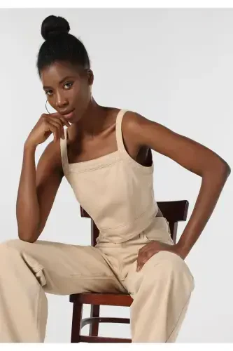 Women's sleeveless crop top in light brown - 1