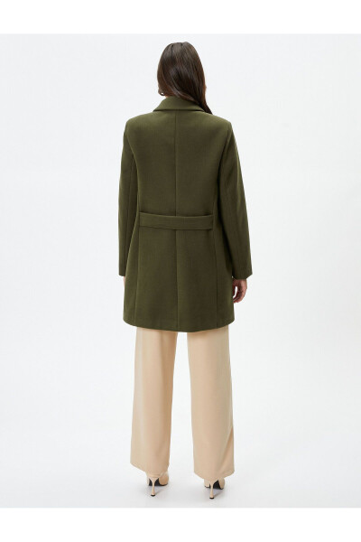 Wool coat with gold buttons, turn-down collar and pockets. - 12