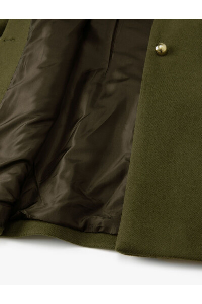 Wool coat with gold buttons, turn-down collar and pockets. - 14