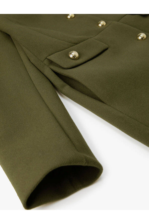 Wool coat with gold buttons, turn-down collar and pockets. - 15