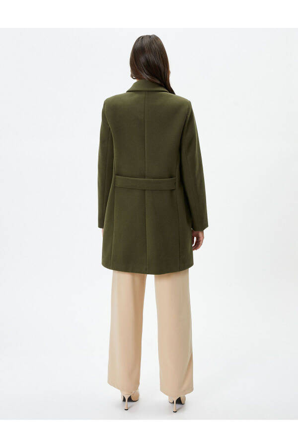 Wool coat with gold buttons, turn-down collar and pockets. - 4