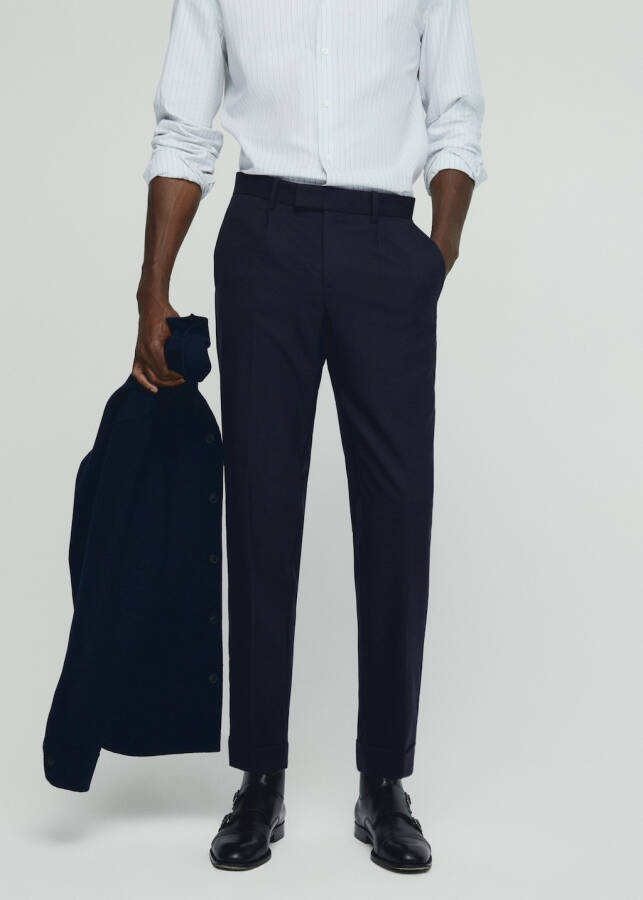 Wool trousers with pleats - 7