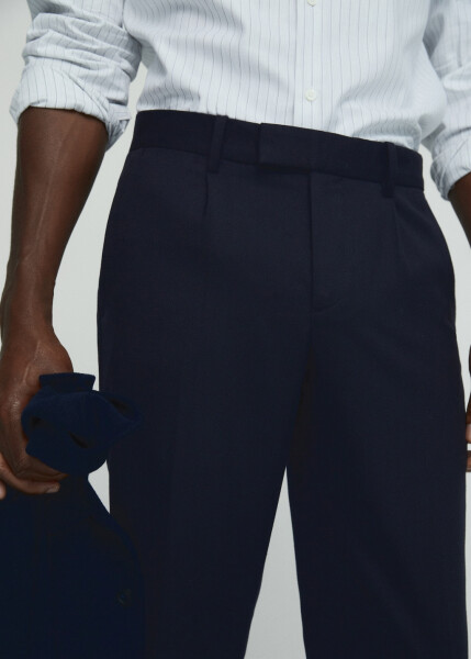 Wool trousers with pleats - 8