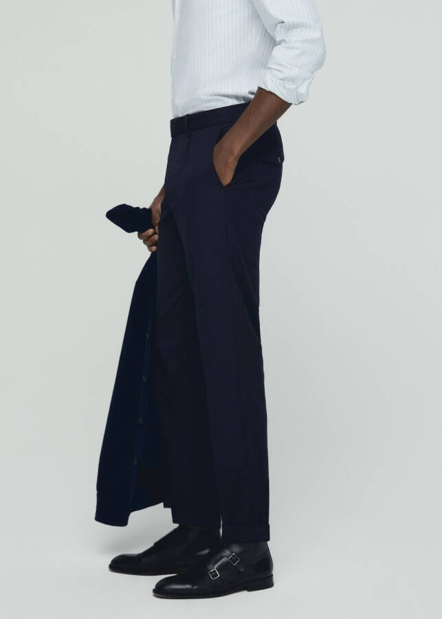 Wool trousers with pleats - 9