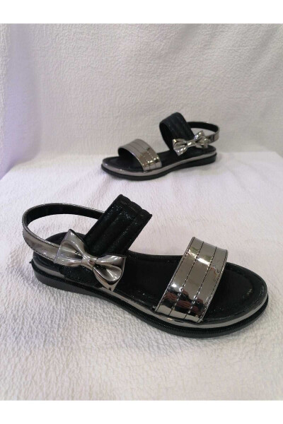 Yag'ona qayishli yostiqli tag'li qiz bolalar sandal - ÖZGÜR KIDS