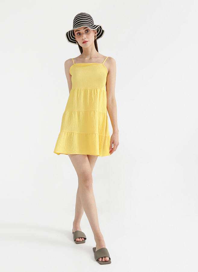 Yellow sleeveless mini dress - 1