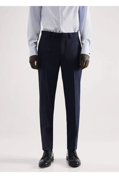 Зауженные брюки из эластичной ткани - MANGO MAN