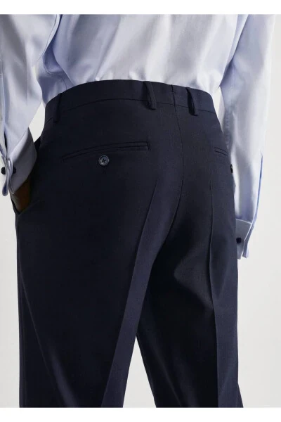 Зауженные брюки из эластичной ткани - 5