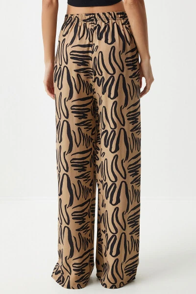 Женские широкие вискозные палаццо бежевого цвета с рисунком EN00606 - 5
